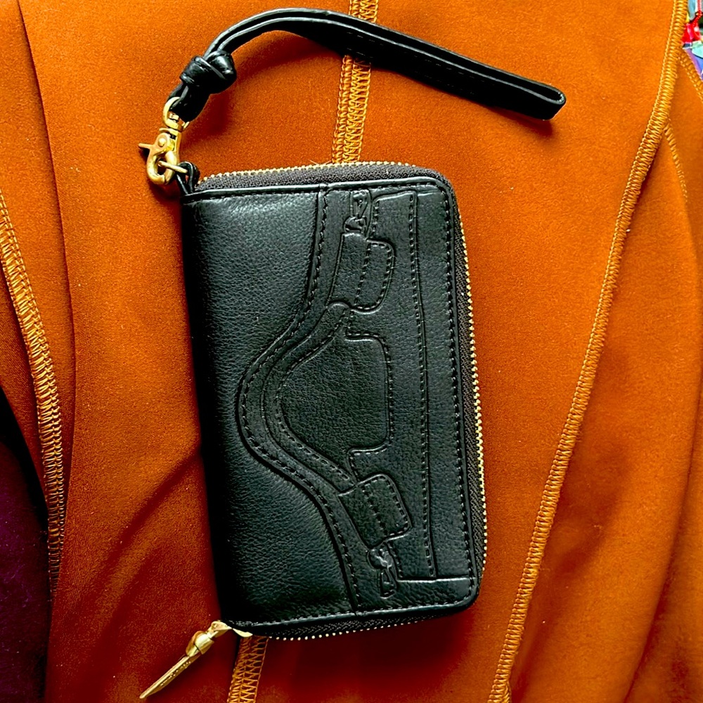 Foley and Corinna black leather wallet with hardware.